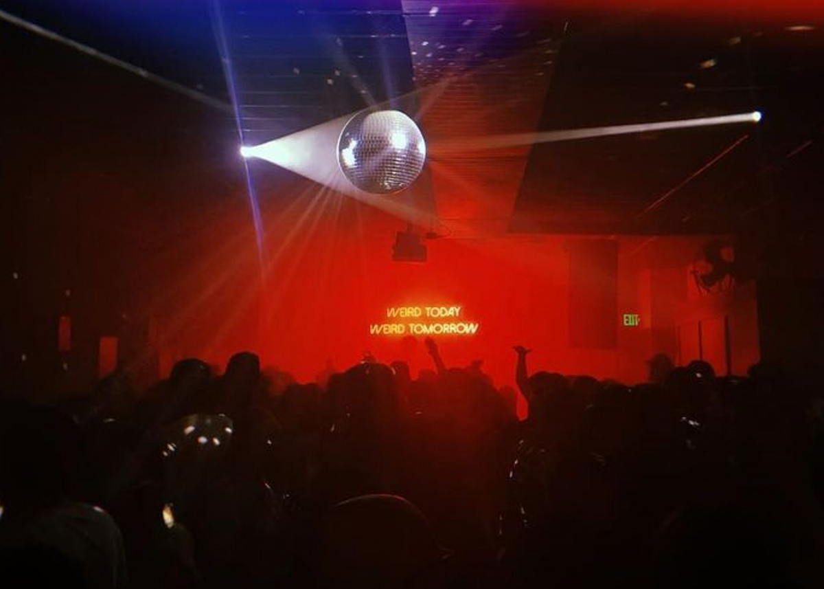 a dance party with a disco ball