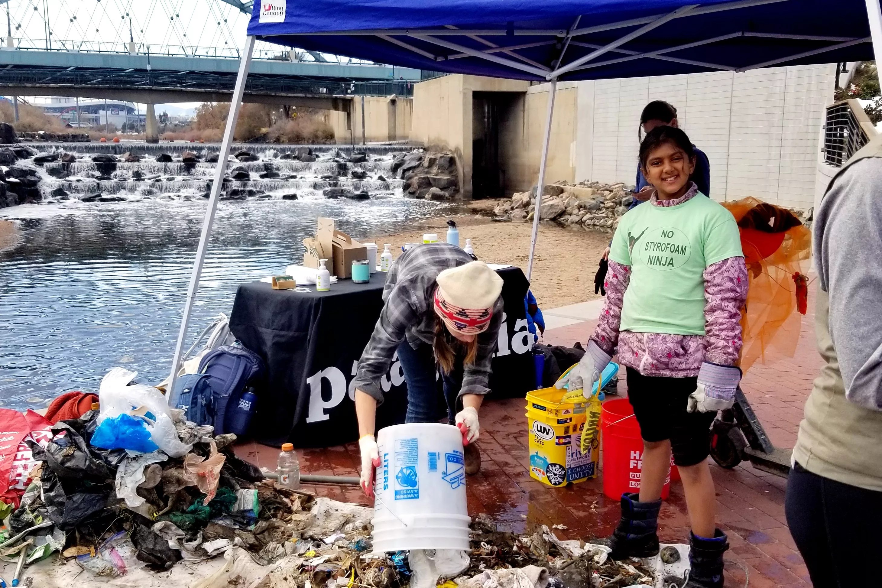Madhvi Chittoor at a river cleanup event in Denver.