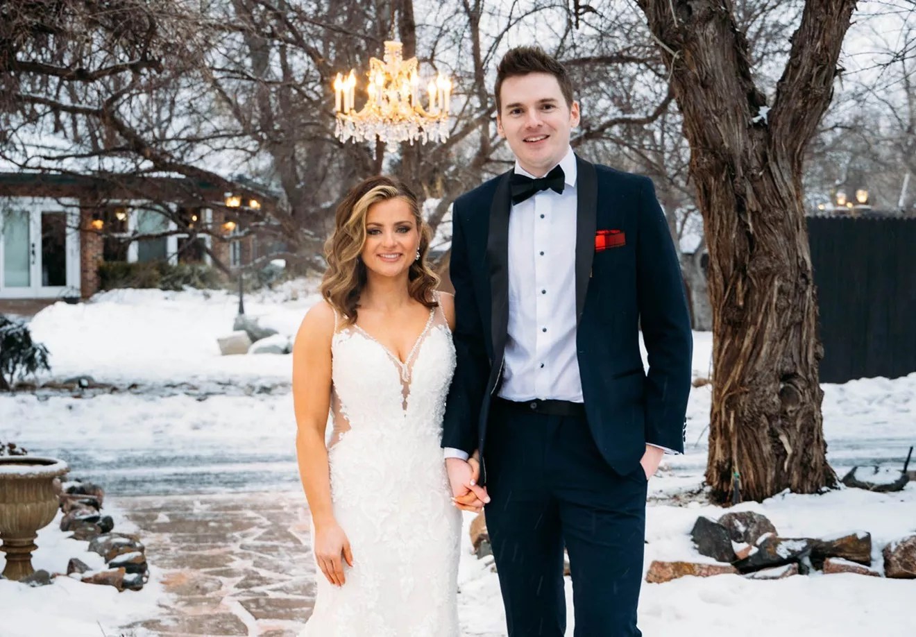 bride and groom in snow