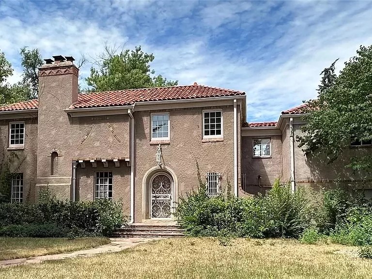A large red-brick home.
