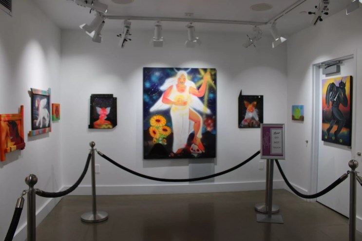 paintings hung on a wall