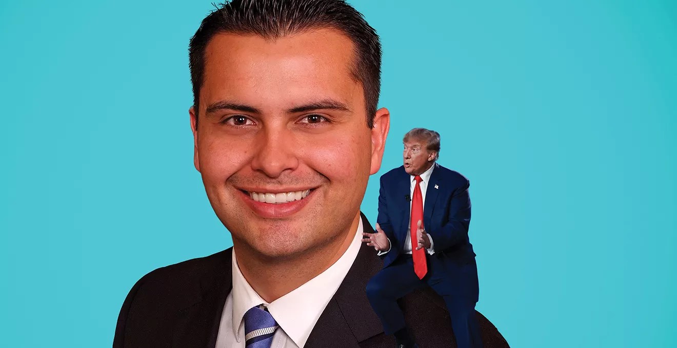 Dave Williams with a small Donald Trump sitting on his shoulder.