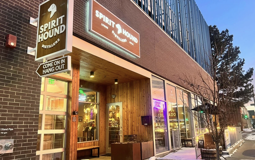 sign hanging over exterior entrance