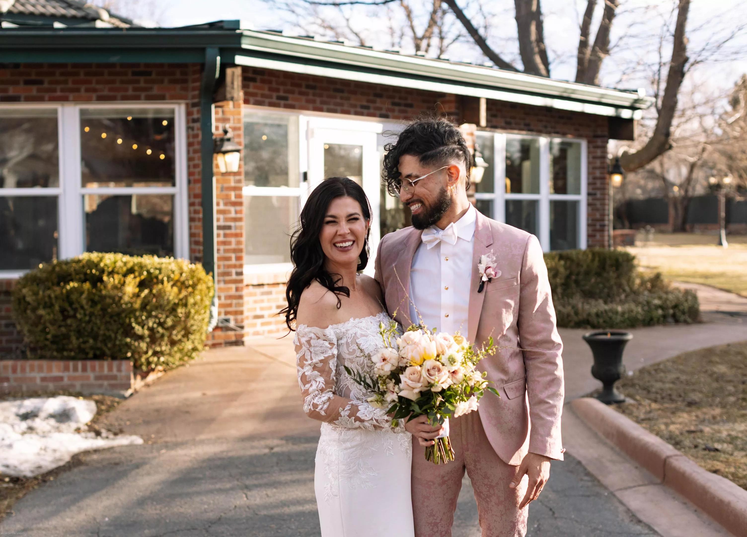 Chloe and Michael pose for wedding portraits.