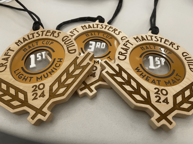 Three wooden medals
