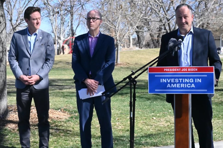 Denver Mayor Mike Johnston at a press conference in a park