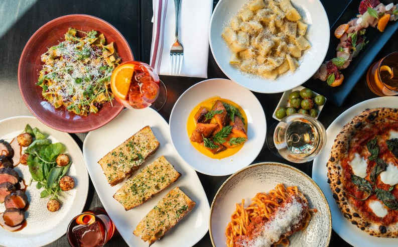 a variety of dishes including pasta and pizza