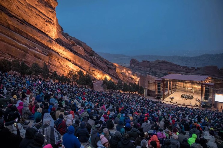 red rocks crowd with candles.
