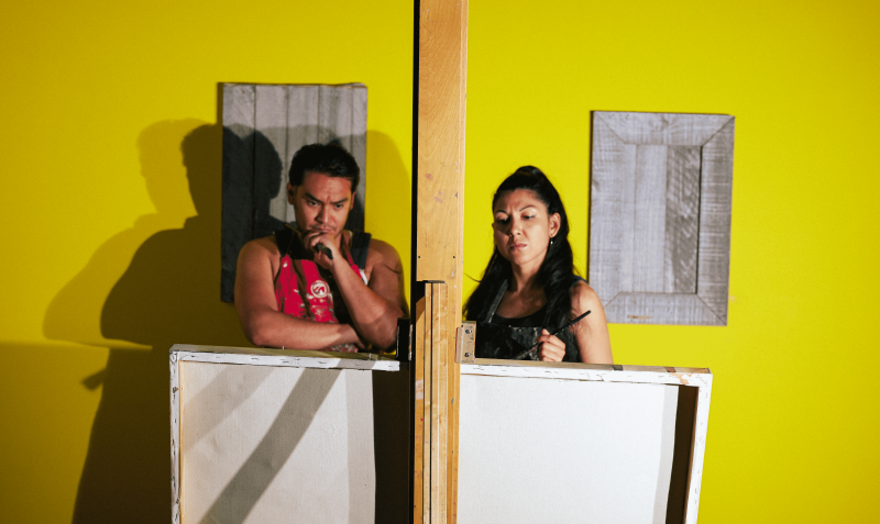 man and woman painting