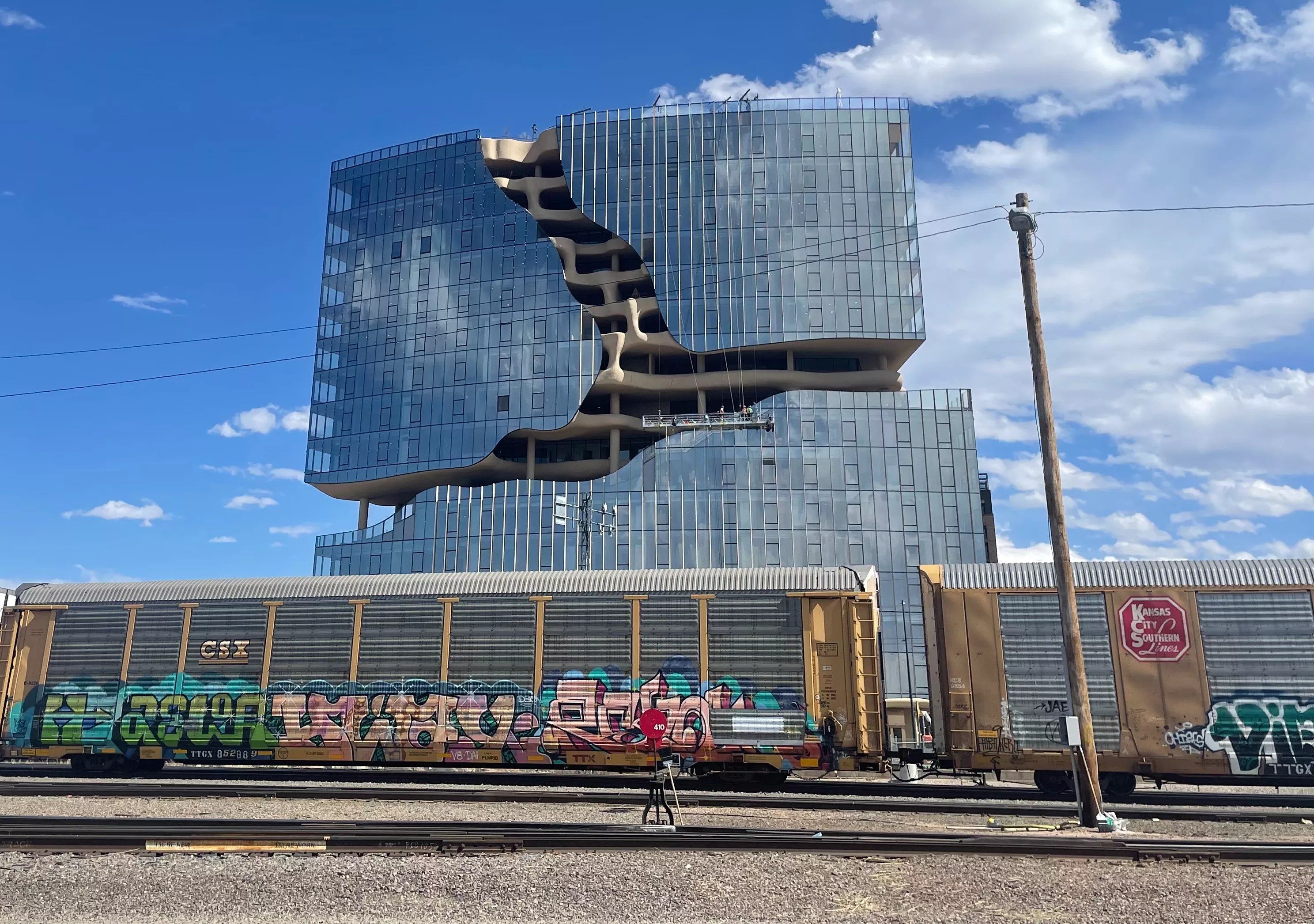 One River North apartment complex behind train track in Denver