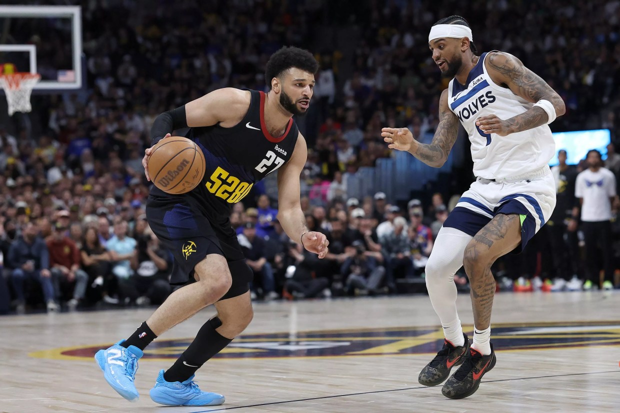 Jamal Murray is guarded by Nickeil Alexander-Walker