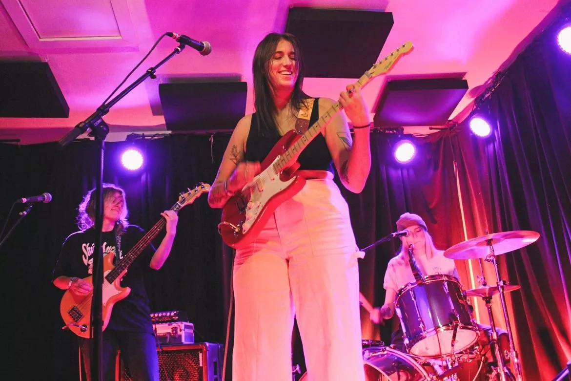 woman playing guitar