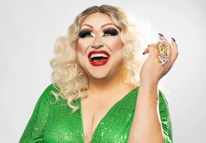 drag queen in green dress