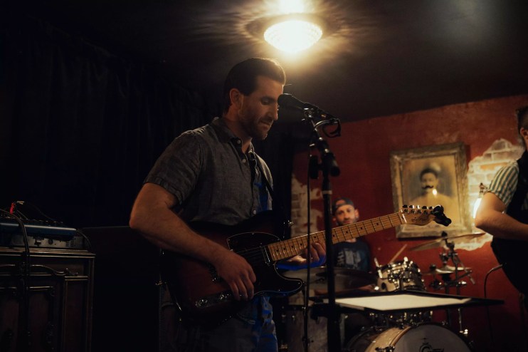 man playing guitar