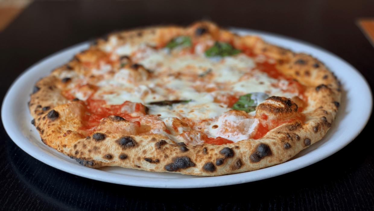 pizza with cheese, char