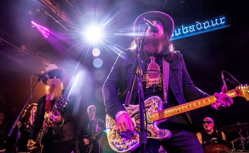 two guitarists on stage