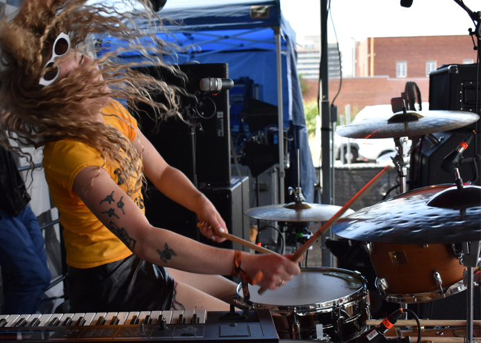 woman playing drums