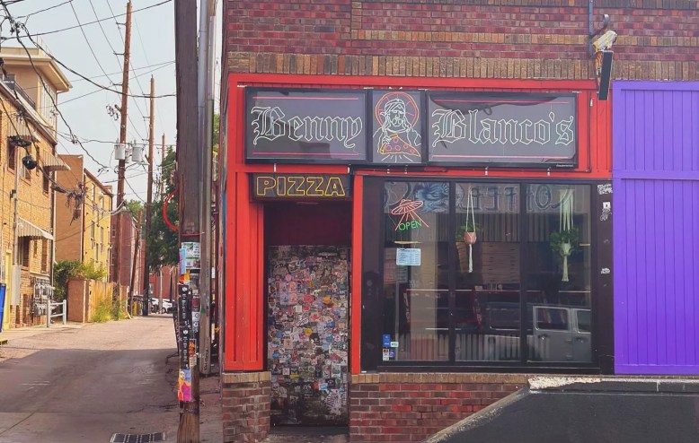 exterior of a pizza slice shop