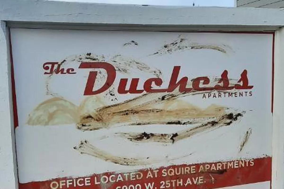 Feces is smeared on a sign.