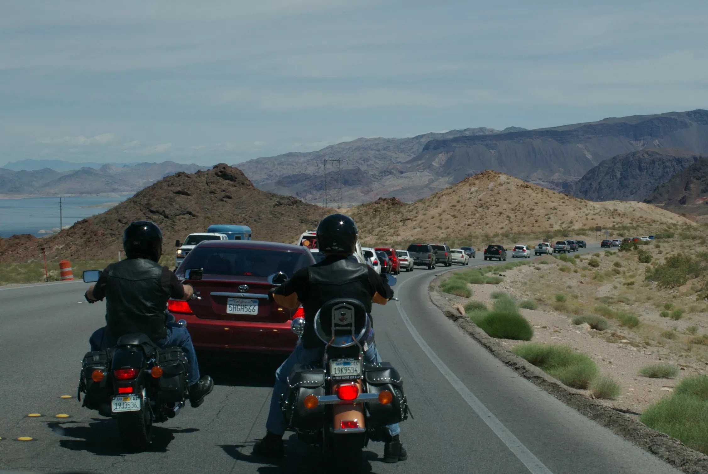 Motorcycles stopped in traffic