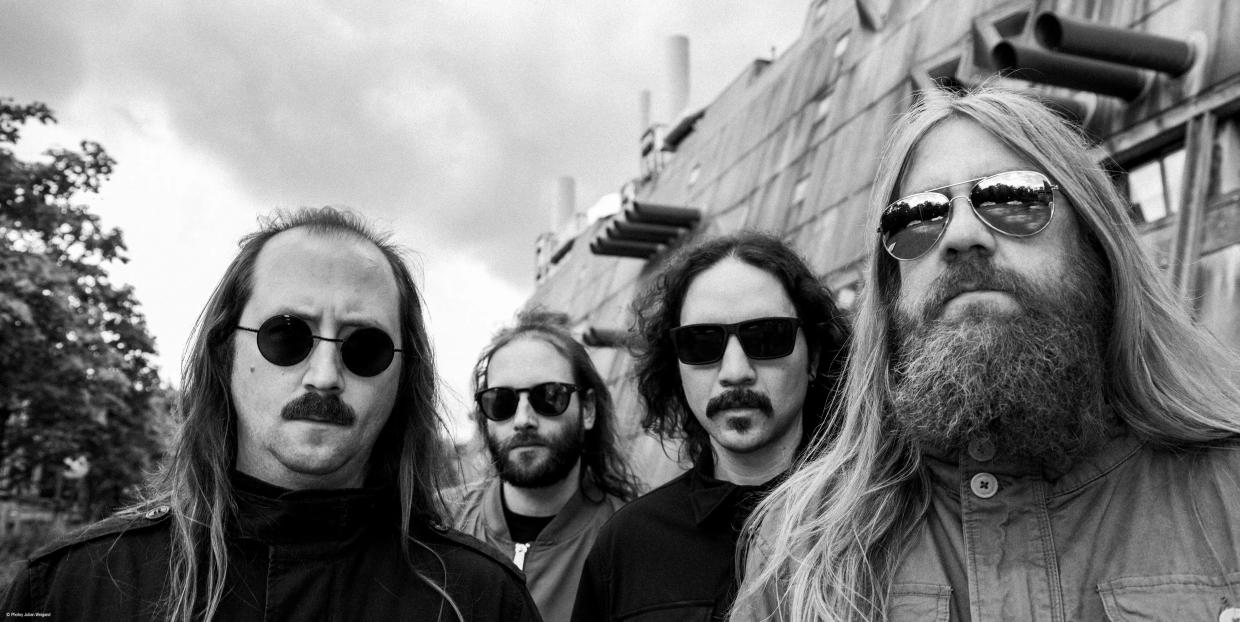 The members of Blood Incantation standing together