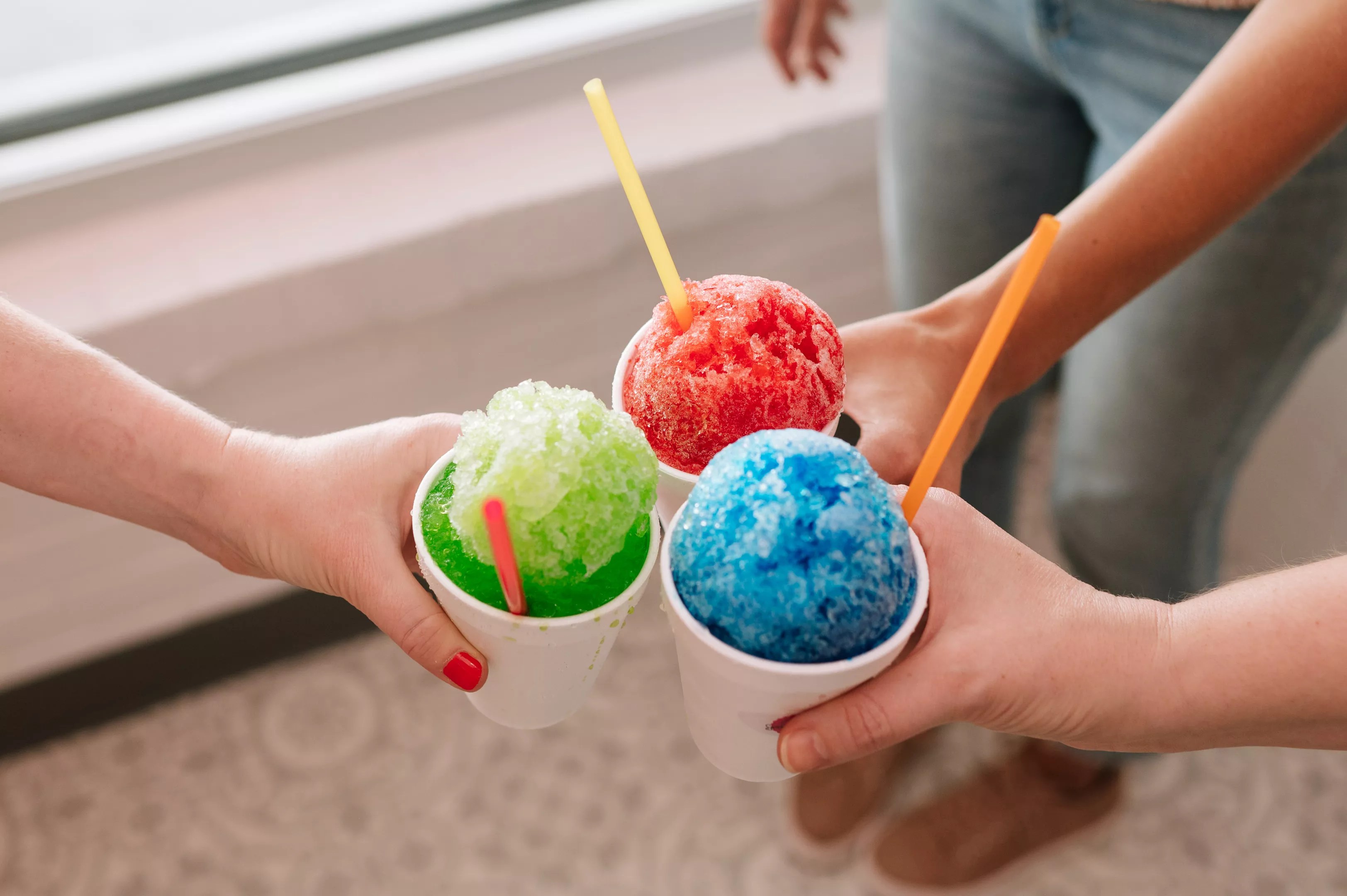 three cups of shaved ice