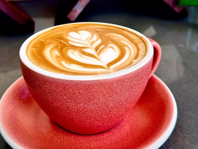 latte in a red mug