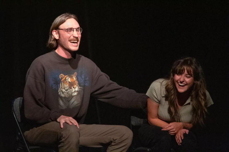 two people laughing