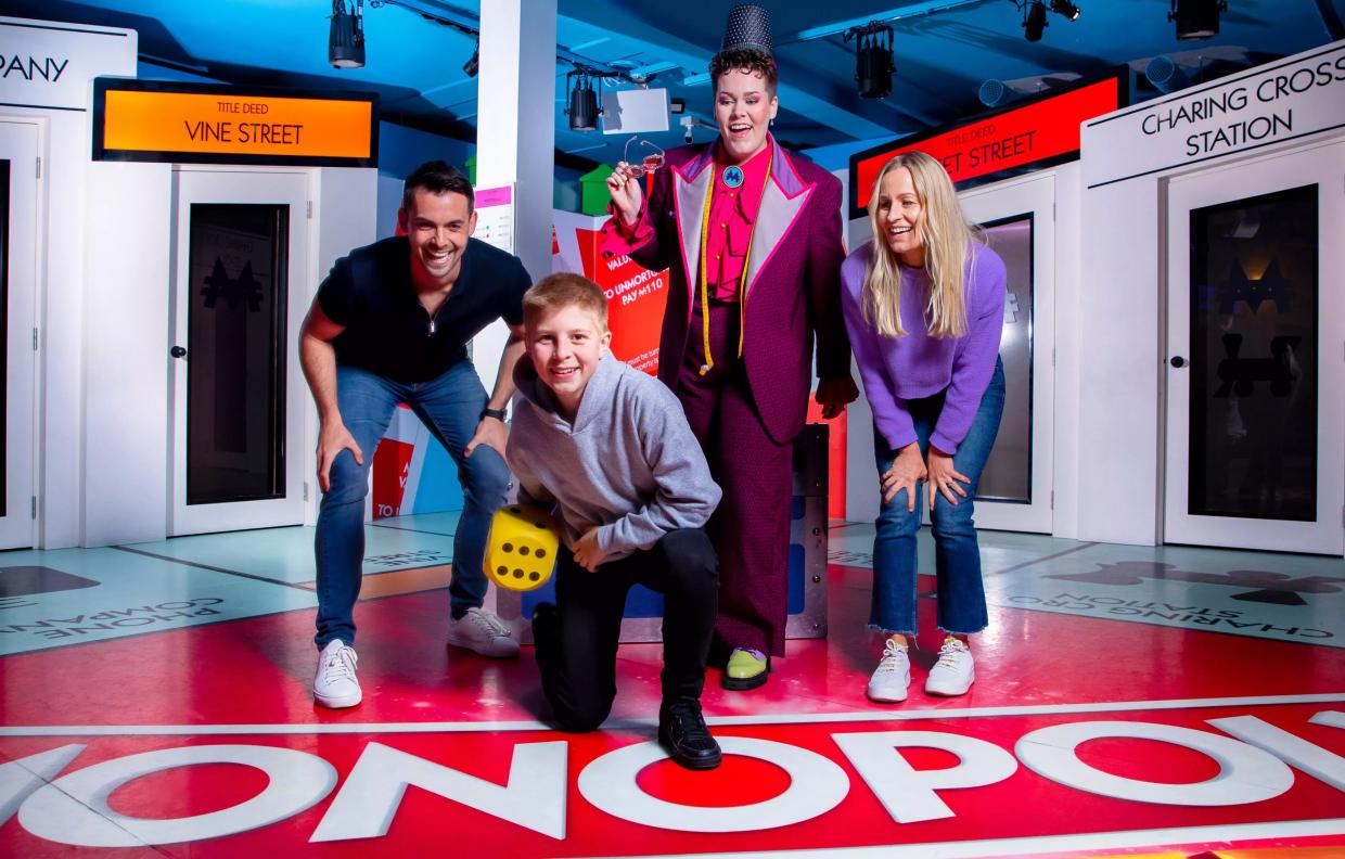 people on big monopoly board