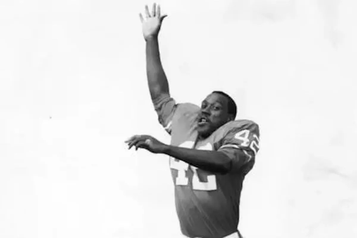 A man jumps.