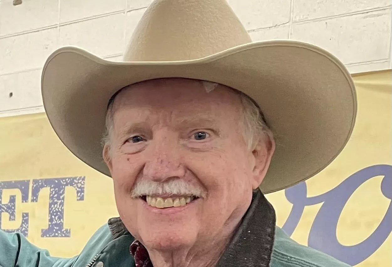 man in cowboy hat.