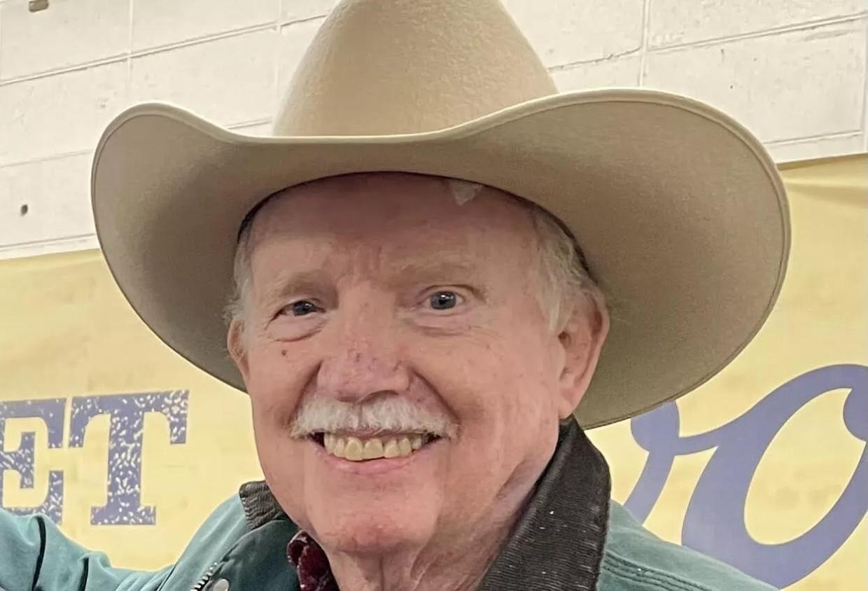 man in cowboy hat.