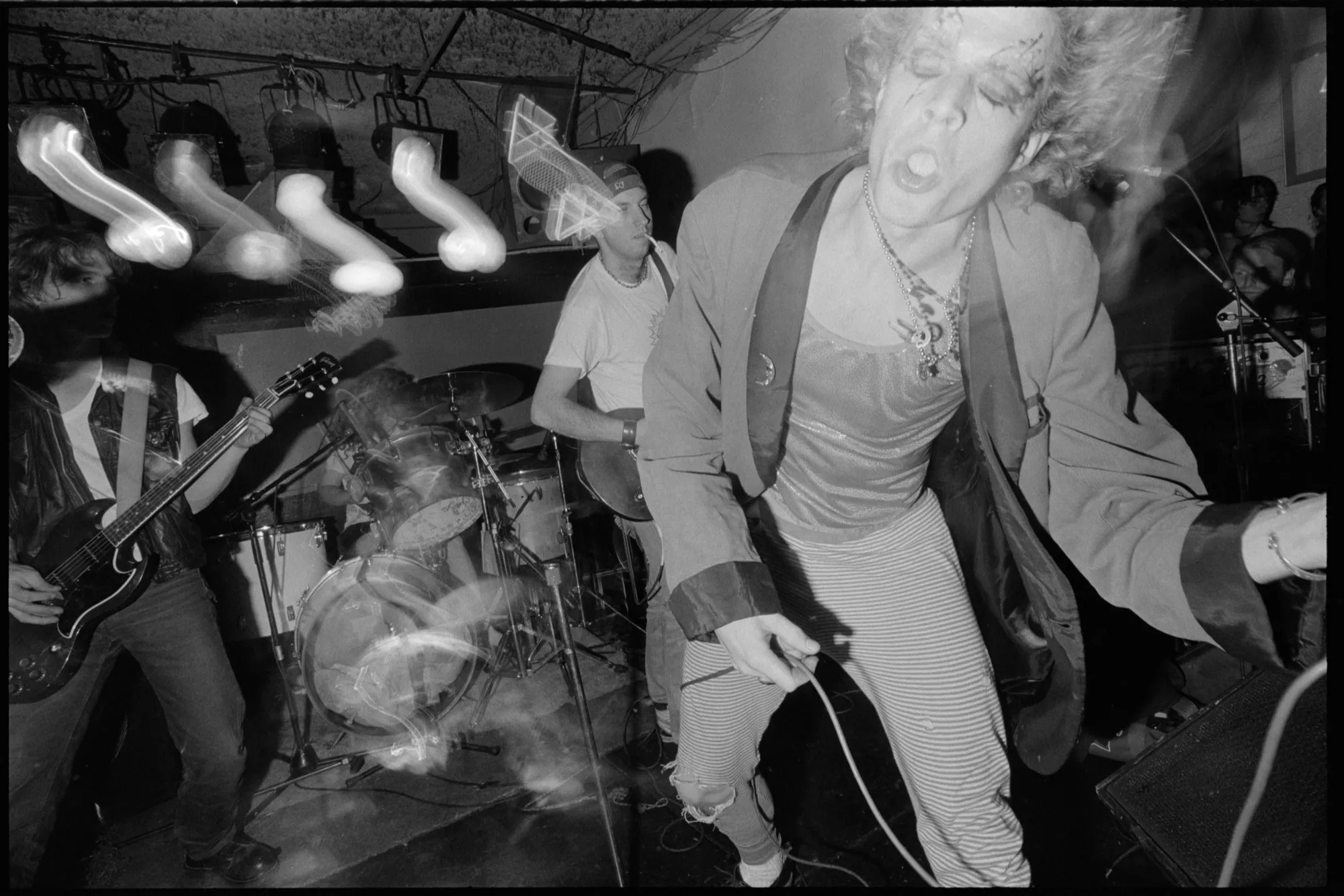 The Fluid playing onstage.