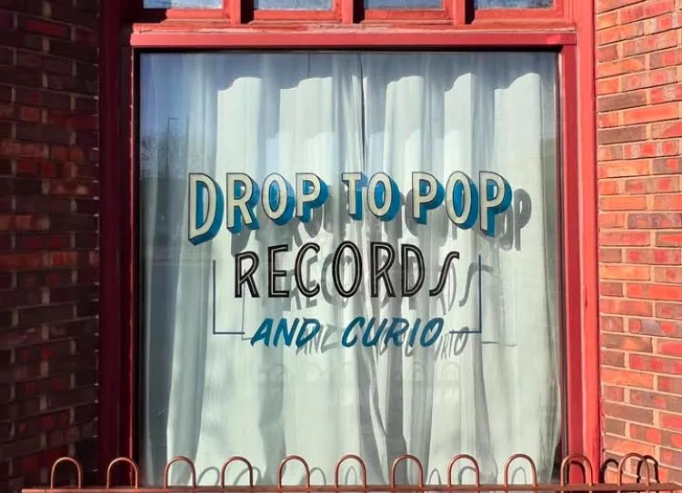 The store front of Drop to Pop Records and Curio