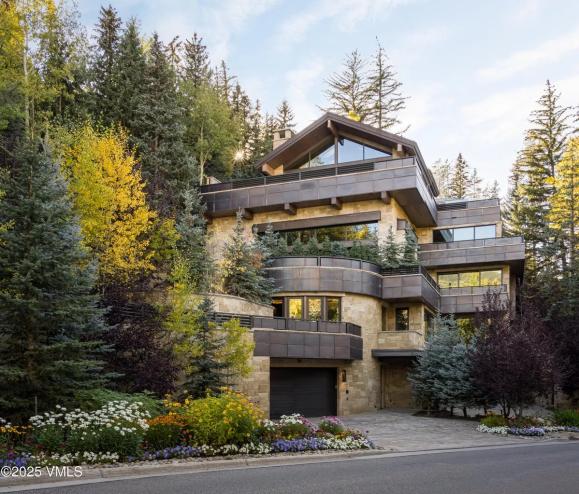 Vail mansion with Aspen trees