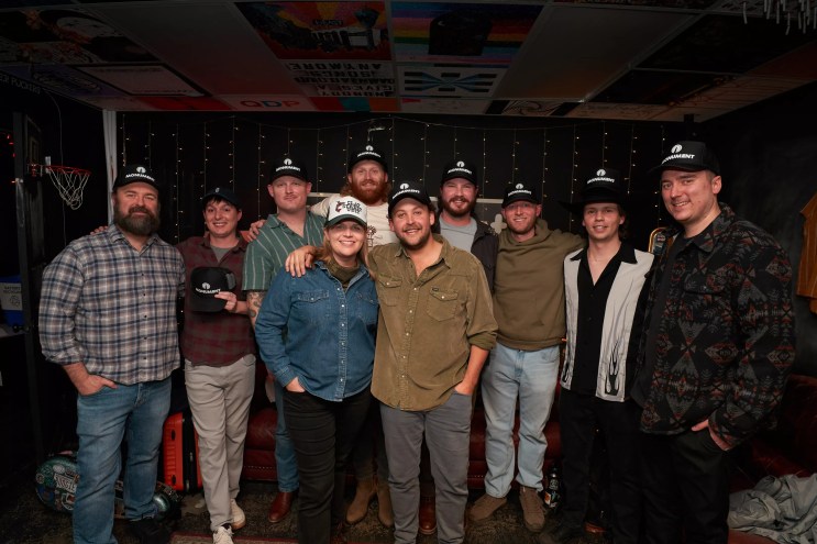 a bunch of men in hats