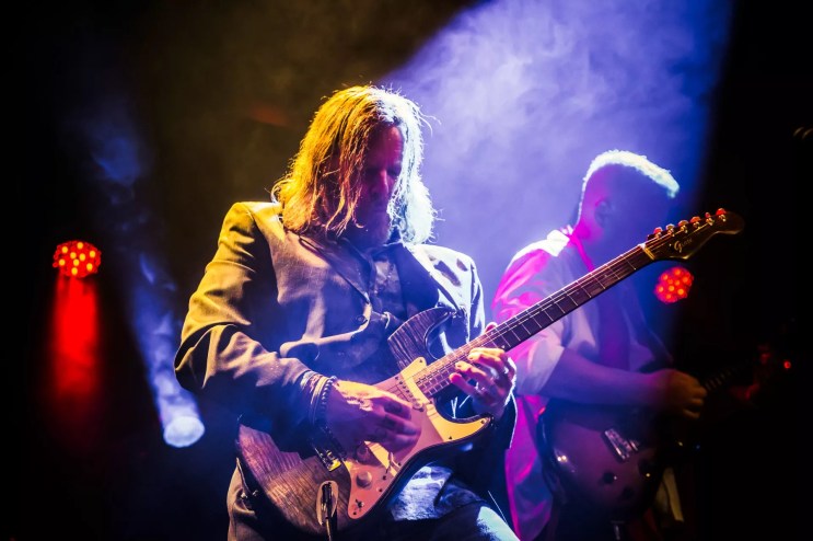man playing guitar
