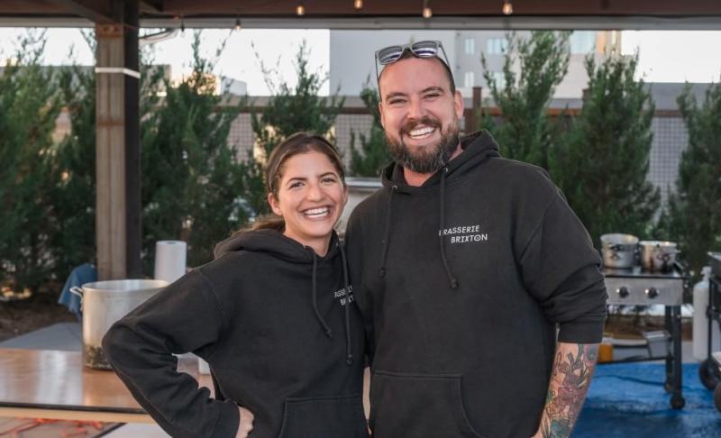 woman and man in black hoodies