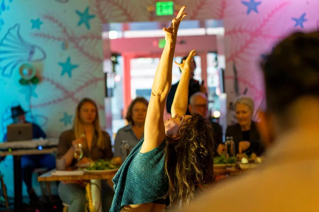 A performer in a restaurant.