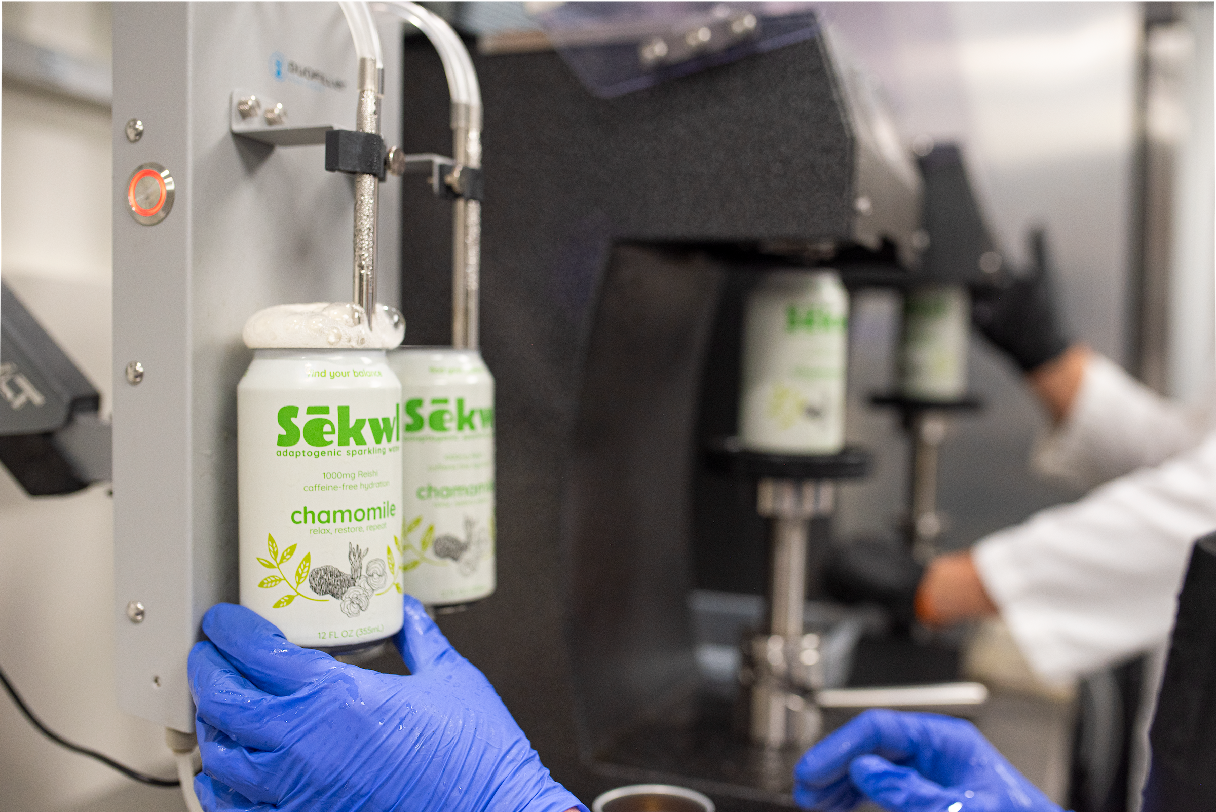 Chamomile and reishi sparkling water being canned at Sēkwl