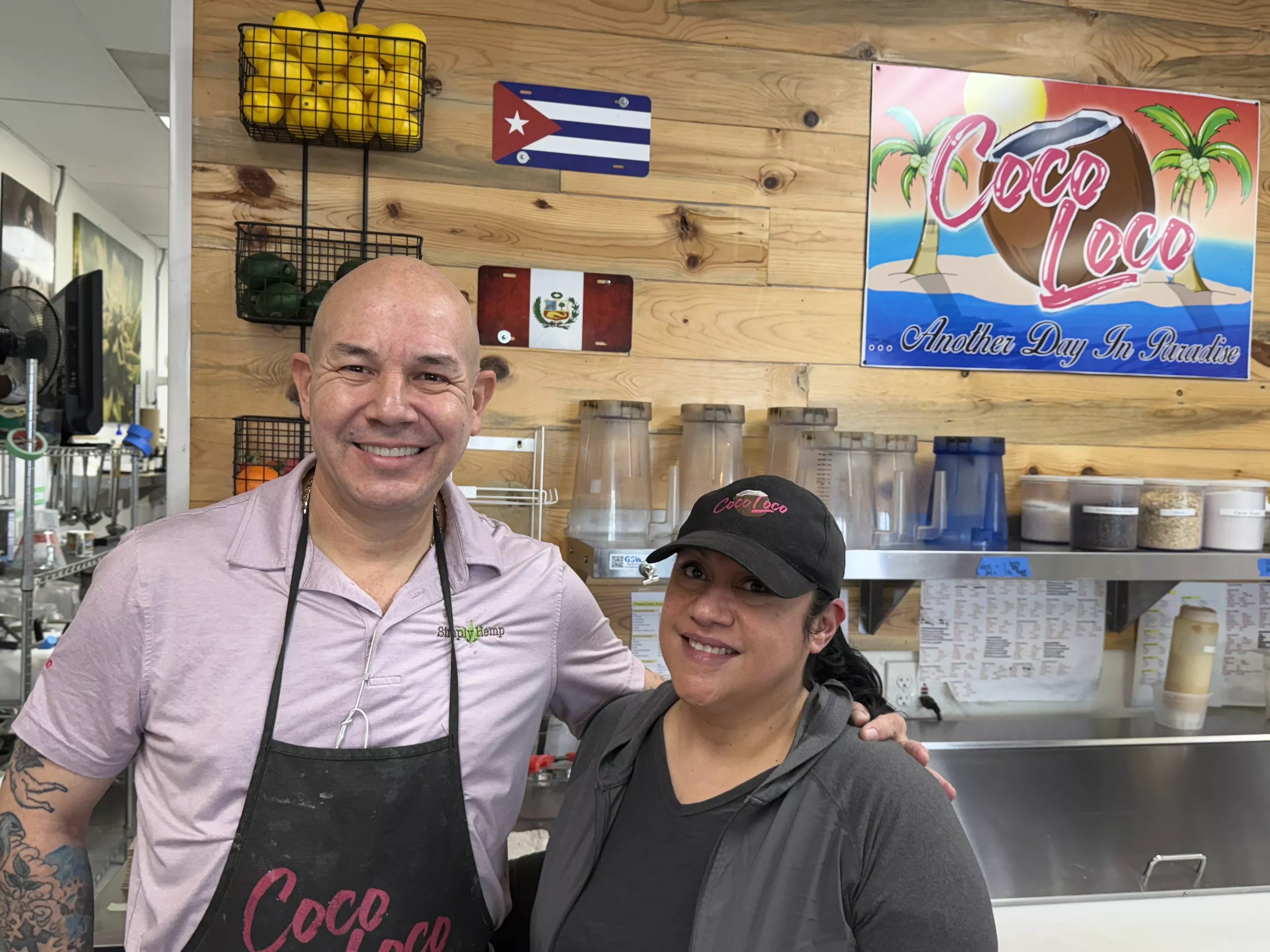 man in apron, woman in hat