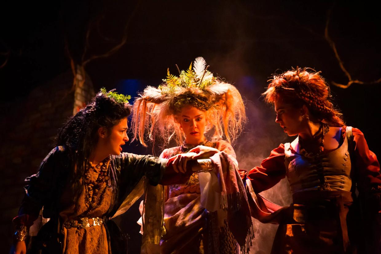 Actors perform in a Shakespeare play.