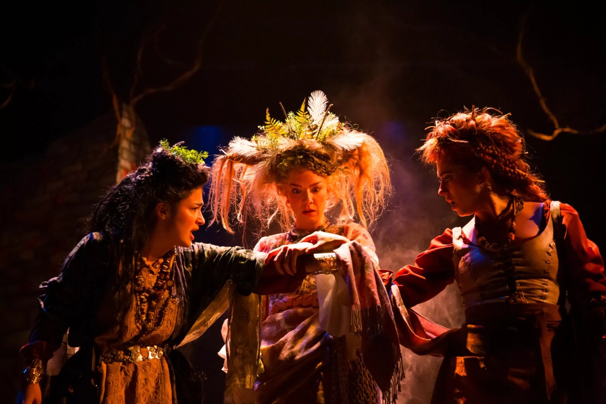 Actors perform in a Shakespeare play.