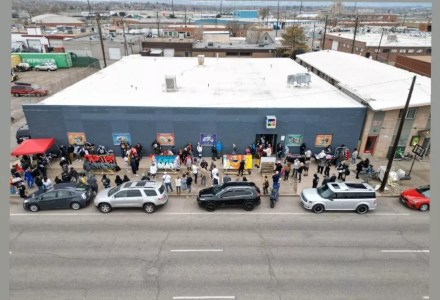 people outside a building in Denver