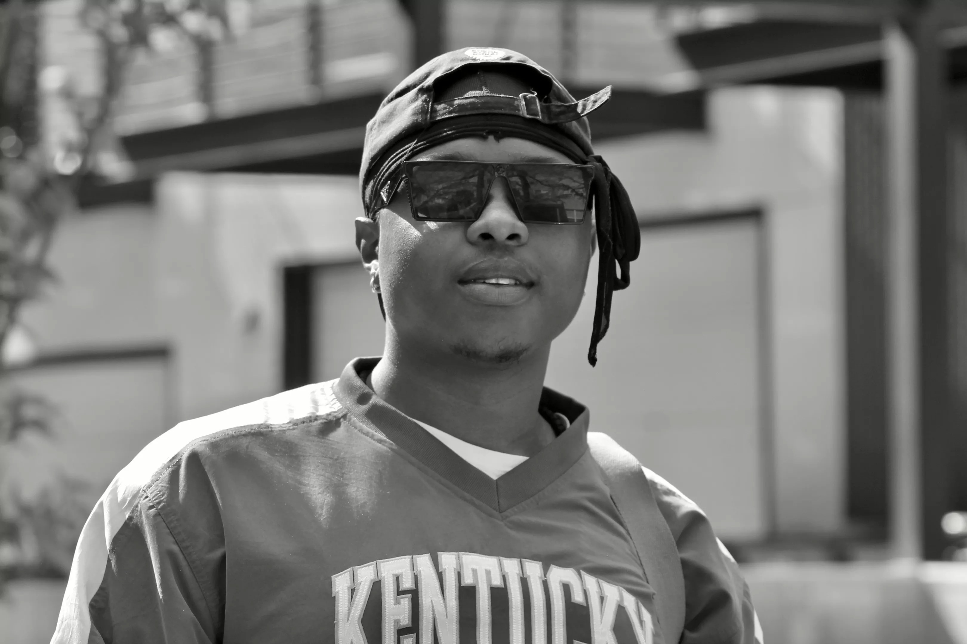 man in a hat and sunglasses