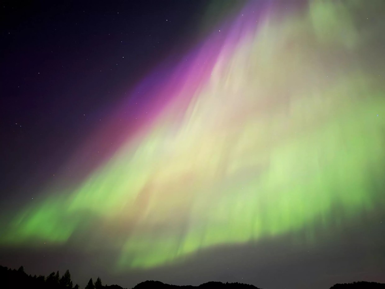 A green and purple sky