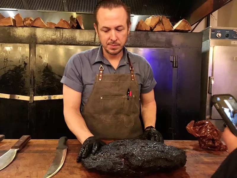 man with barbecue meat.