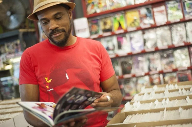 A man flips through a book