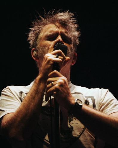 man at microphone