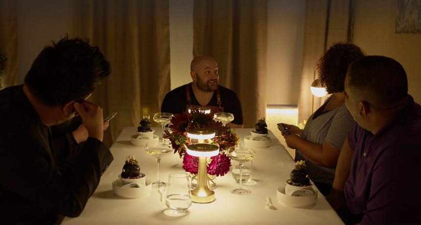 man at dinner table